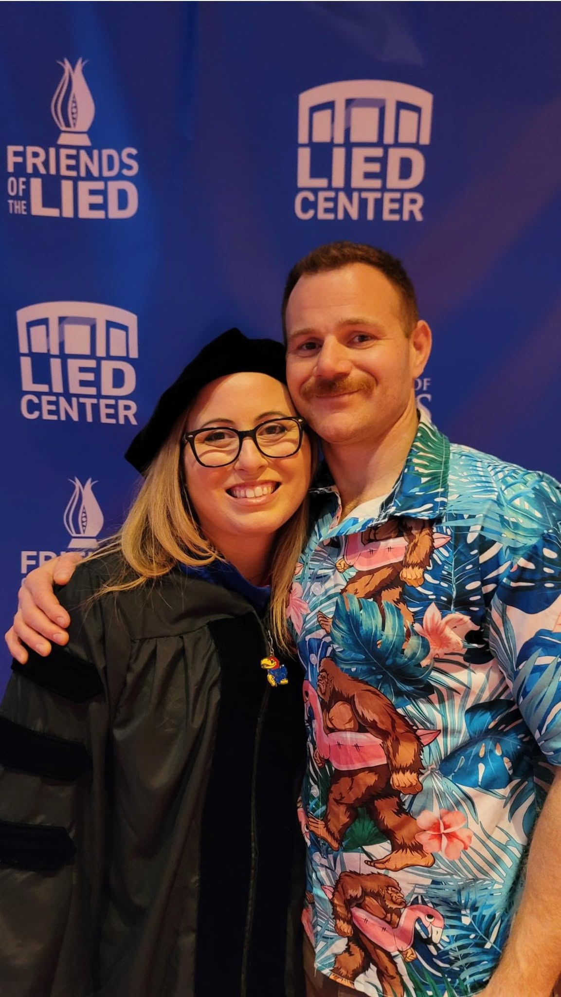 Aryeh Goldman and his wife at her graduation.